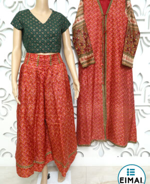 Ready to wear printed pure silk pleated palazzo/culot with pockets and matching long shrug combined with green khari printed blouse curated and designed from printed heirloom silk saree