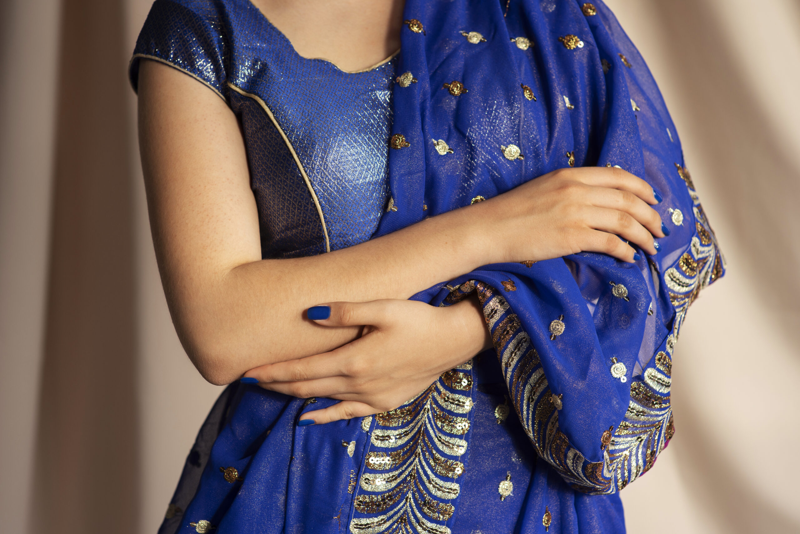 close-up-hands-woman-wearing-traditional-sari-garment