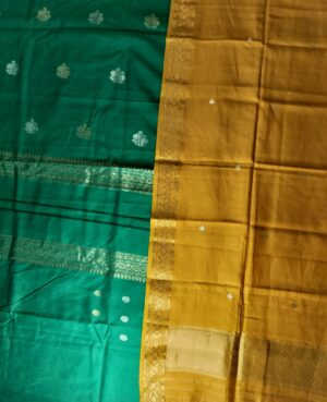 Semi Stitched Pure Silk – Cotton Handloom Suit with Kadua Sona Roopa Zari Bootas and borders Woven all over Kurta and Dupatta. Emerald green kurta and lower, Mustard Yellow Dupatta (3 Piece Suit)