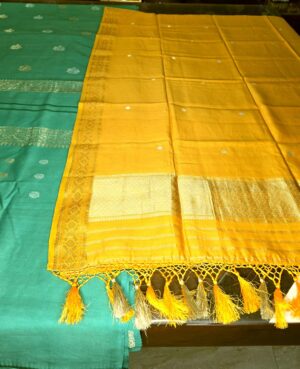 Semi Stitched Pure Silk – Cotton Handloom Suit with Kadua Sona Roopa Zari Bootas and borders Woven all over Kurta and Dupatta. Emerald green kurta and lower, Mustard Yellow Dupatta (3 Piece Suit)