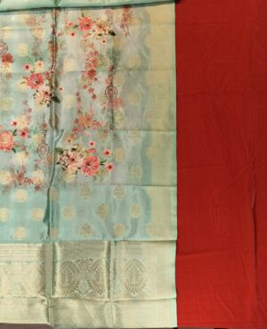 Soft Micro Velvette Same on Same Fabric in A Blur Orange Color Palette Teamed with a Pure Katan Silk Digital Print Zari Boota Woven Dupatta finished with tassles in Pista Green base color and matching blur orange florals.