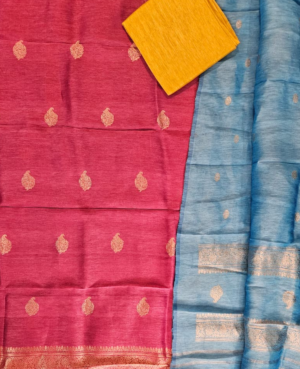 A COLOR BLOCK THREE PIECE HANDLOOM KADUA SUIT SET WOVEN IN PURE LINEN BY SILK AND GOLD ZARI. THE KURTA IS MAJJENTA PINK/LILAC MIX WITH GOLD ZARI ARTISTIC AMBI BOOTAS IN FRONT AS WELL AS THE BACK AND INTRICATE KADUA ZARI BORDERS WOVEN TO PERFECTION.